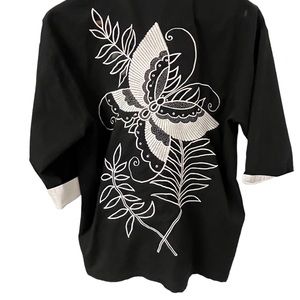 CC embroidered blouse. Button down  pit to pit 19” fits a medium.